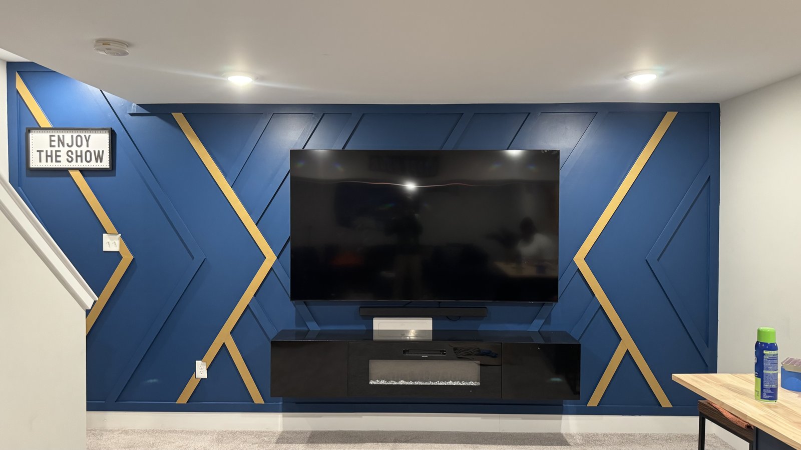 Cobalt board-and-batten accent wall with gold inlays and marquee sign by SEIN ME in Blackwood, New Jersey