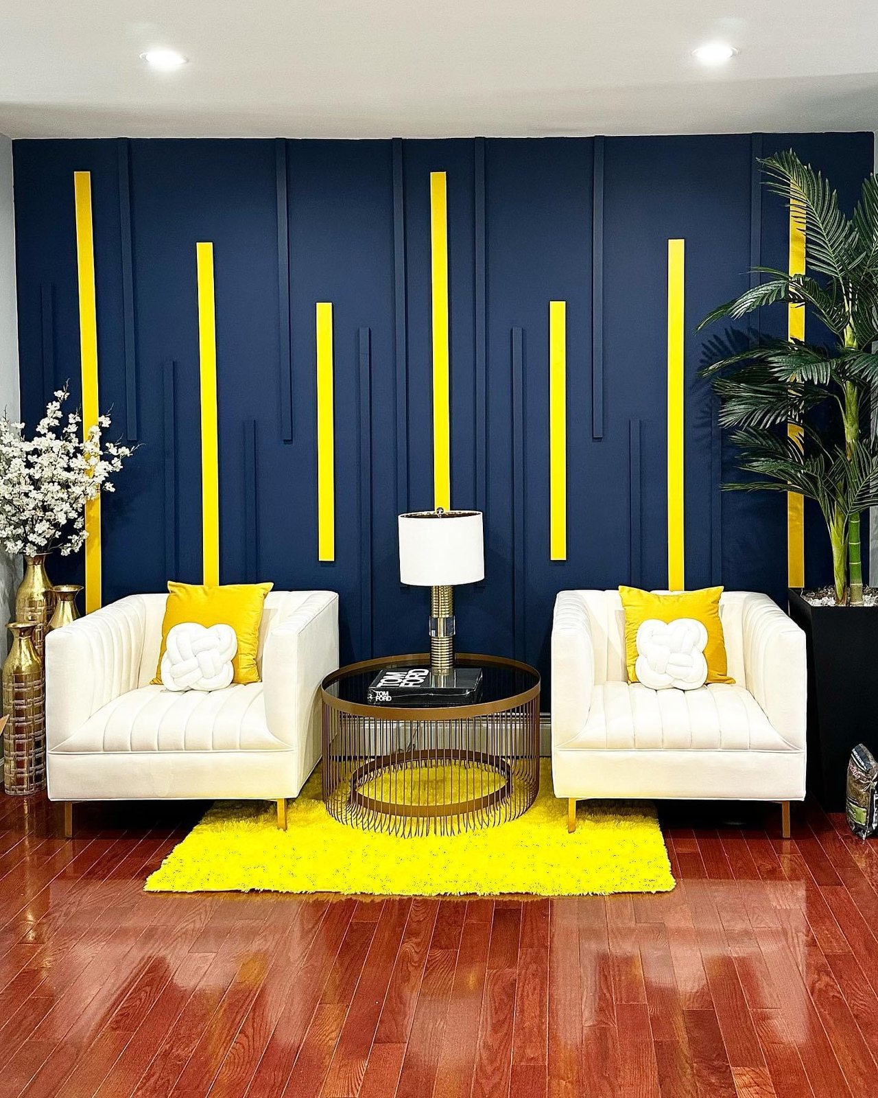 Navy board-and-batten accent wall with gold wood slats installed by SEIN ME in Short Hills, New Jersey