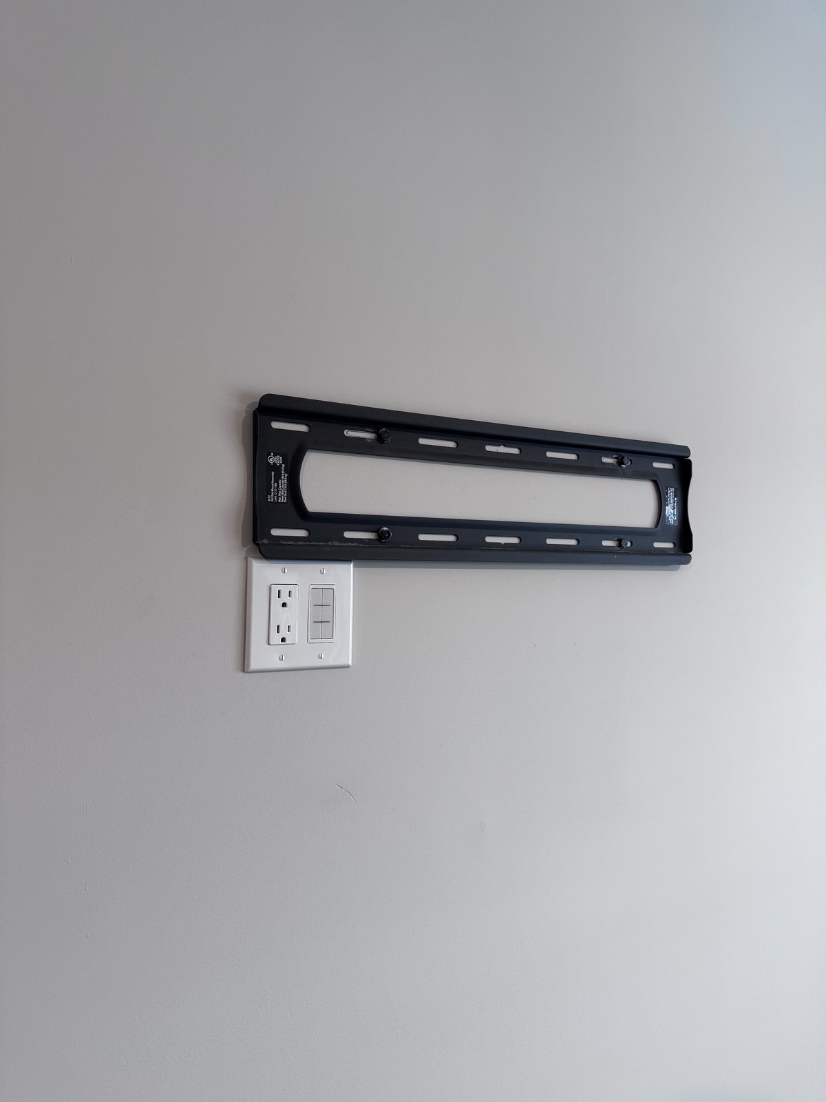 Recessed outlet and low-profile TV wall plate installed for concealed power by SEIN ME in Union, New Jersey