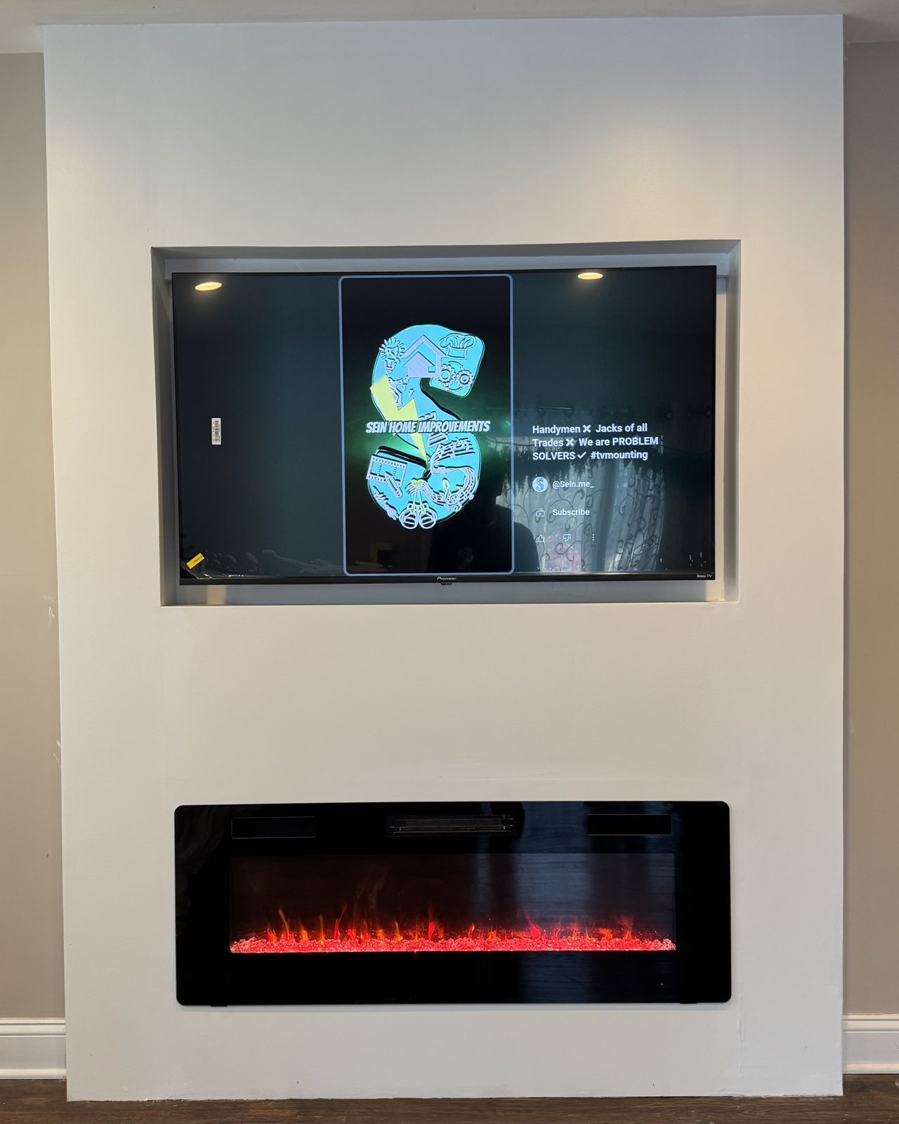 Recessed TV wall with linear fireplace by SEIN ME
